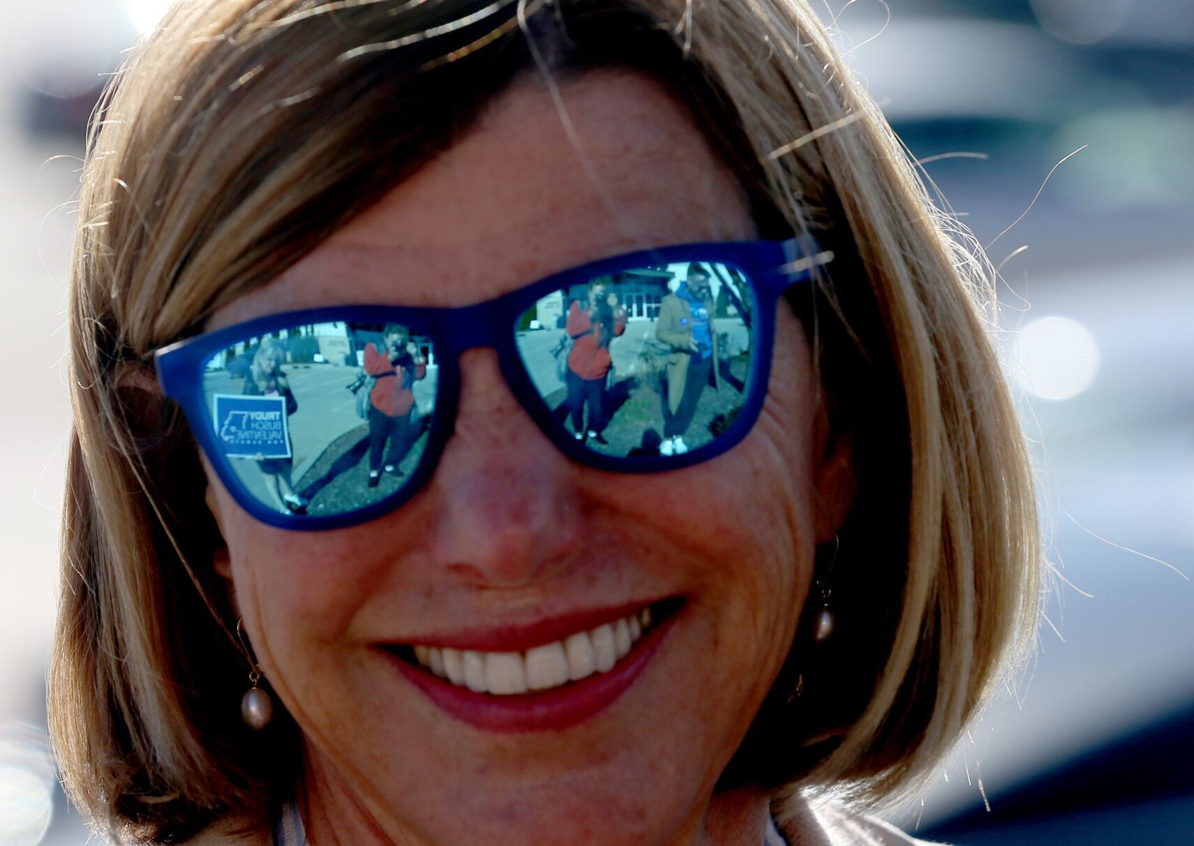 Democratic U.S. Senate candidate Trudy Busch Valentine campaigns outside early voting places